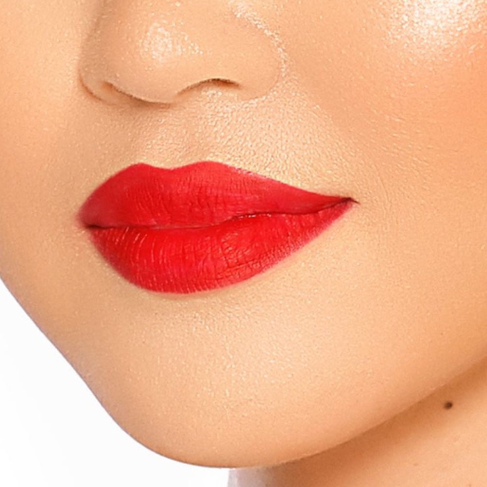 A close-up image of a woman who is wearing red lipstick lips 